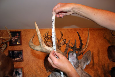 What are some forms used to score deer antlers?